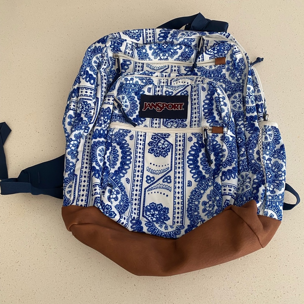 Jansport Blue and White Floral Backpack with Brown Base